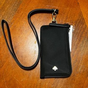 Kate Spade Cameron Lanyard. Gold hardware. detachable lanyard. 5.3" h x 2.8" w